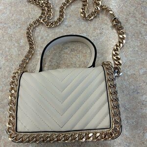 Elegant Cream Quilted Handbag with Gold Chain